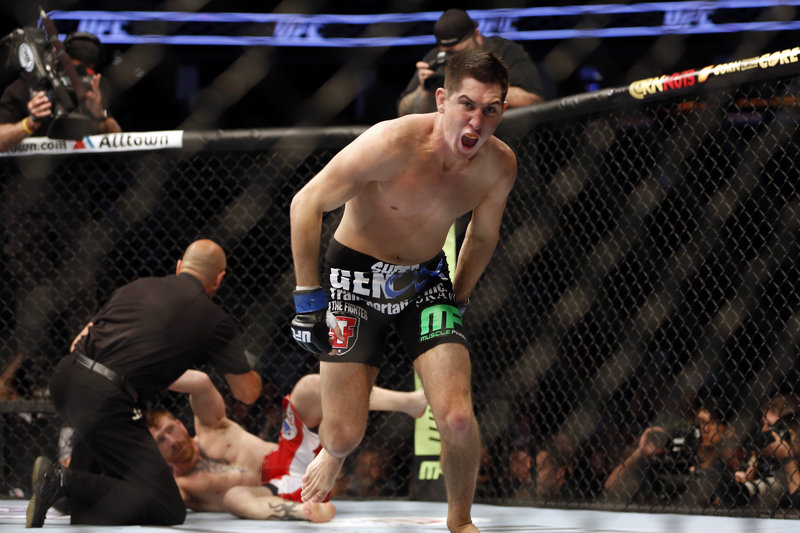 Steven Siler celebrates after knocking out Maine’s Mike Brown in the first round during a UFC show Saturday night in Boston.