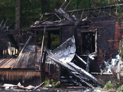 Charred remains are all that is left of Wescustogo Hall in North Yarmouth, which served for years as the town community center.