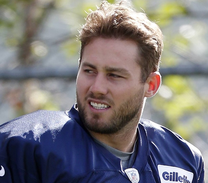 Patriots linebacker Dane Fletcher walks on the field during training camp in Foxborough, Mass., last month.