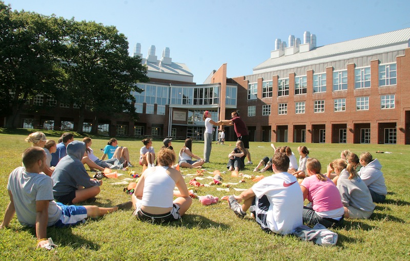 In this 2007 file photo, freshmen participate in a team-building exercise on the University of New England campus in Biddeford. dozen Maine high school graduates will get scholarships to study science, technology, engineering and math at the University of New England, thanks to a $620,000 grant from the National Science Foundation.