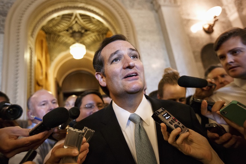 Sen. Ted Cruz, R-Texas talks to reporters as he emerges from the Senate Chamber on Capitol Hill in Washington, Wednesday, Sept 25, 2013, after his overnight crusade railing against the Affordable Care Act, popularly known as "Obamacare." Cruz ended the marathon Senate speech opposing President Barack Obama's health care law after talking for 21 hours, 19 minutes.