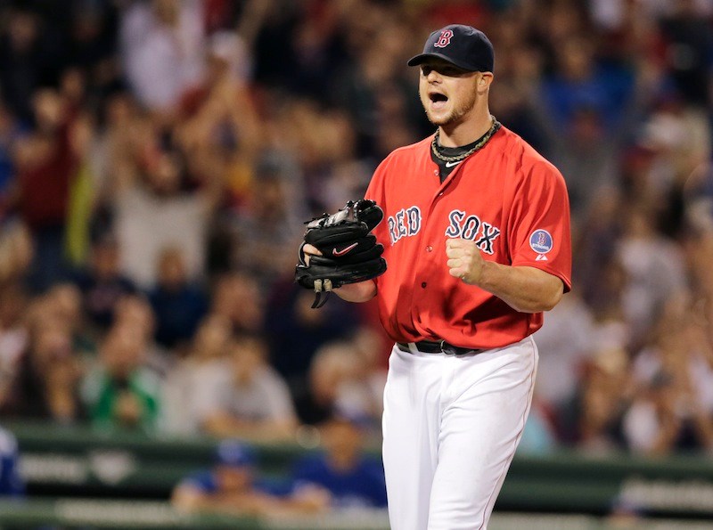 Jon Lester and the Red Sox were in a fist-pumping mood Friday as they clinched the American League East title.