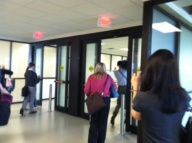 People heading in the right direction out an exit are monitored by a new security system Tuesday at the Portland International Jetport.
