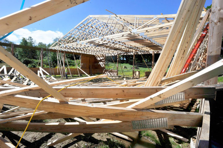 Most of the collapsed arena being built on the Nash Road in Windham remained intact but about half of the roof will need to be rebuilt.