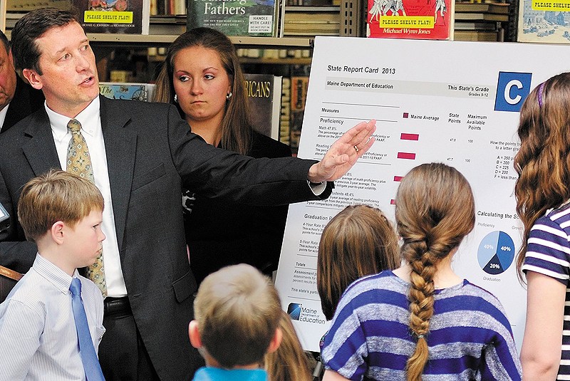 Education Commissioner Stephen Bowen unveils the state’s A-F grading system at the Maine State Library on May 1. Struggling schools need support as they work to improve performance.