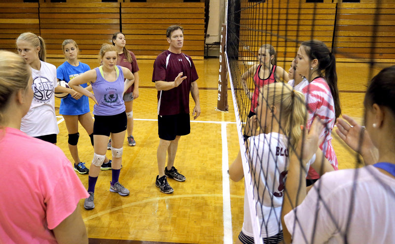 Thornton Academy Coach Keith O’Leary makes a point to his team during practice. Thornton had 90 prospects show up this fall; O’Leary is keeping about 75, spread between varsity, junior varsity and freshman teams.