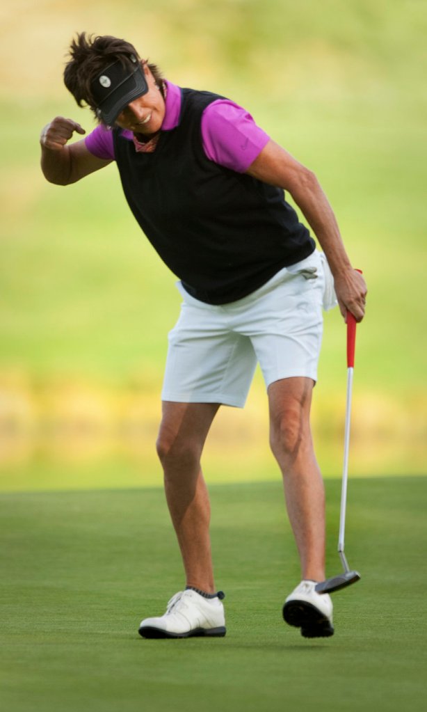 Rosie Jones is pumped after her putt drops for a birdie on the fifth playoff hole, good for a 1-stroke win over Lorie Kane.