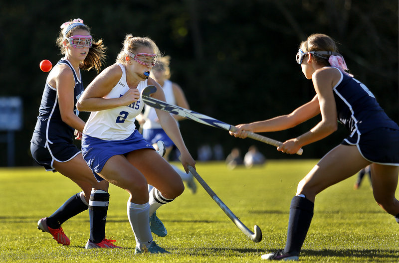 York’s Sarah Panteleos fires the ball past Kennebunk’s Meg Cadigan during the Wildcats’ 5-0 win Thursday.