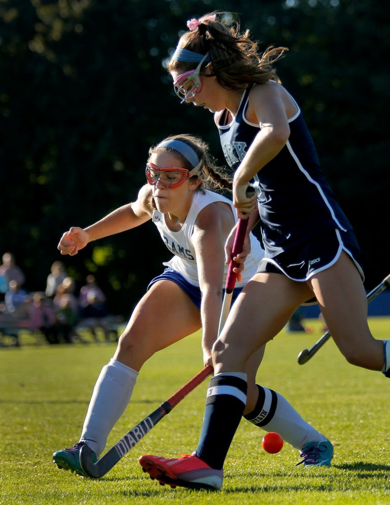 Kennebunk’s Tiffany Weeks knocks the ball away from York’s Taylor Simpson during the Wildcats’ 5-0 win Thursday at Kennebunk.