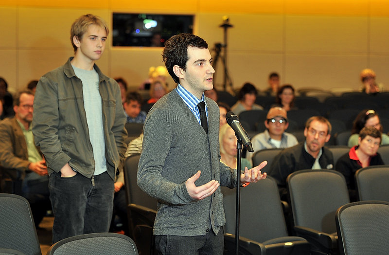 USM Senior Daniel Brandow asks unverisyt president Theodora Kalikow questions Tuesday while physics major and freshman Tyler Nelson prepares to speak next.