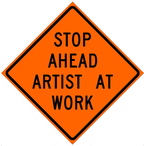 Curtis posted this sign to caution drivers on the road near her home where she walked with a camera strapped to her to create some of her video works.