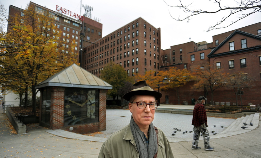 Frank Turek says Friends of Congress Square Park will start collecting signatures right away in an effort to stop the sale of Congress Square Plaza, in background.