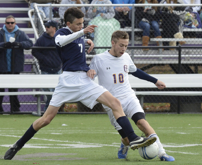 Luther Williams, left, of Westbrook and James Biegel of Cheverus contend for the ball Saturday during Cheverus’ 1-0 victory in a Western Class A boys’ soccer prelim.
