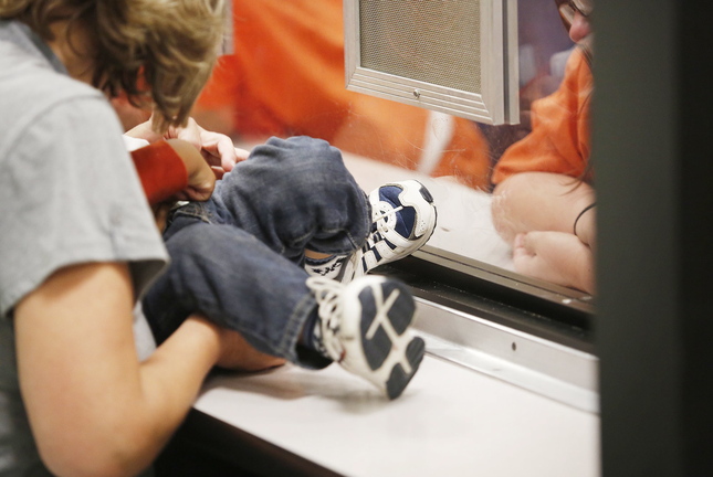 Cumberland County Jail inmates meet with visitors in a June 14 file photo. About 75 percent of inmates in Maine’s county jails have not been convicted of a crime; they are in jail awaiting trial.