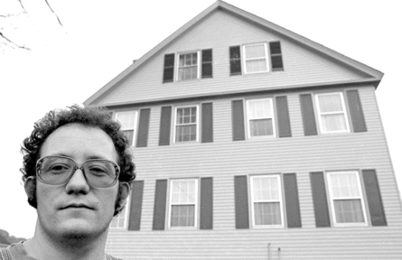 Alan Linnell, stands in front of his reportedly haunted house on Falls Road in Benton, in 1977.