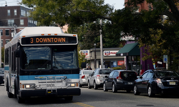 A Metro bus runs along Congress Street in Portland. Greater Portland Transit District officials plan to apply for a federal grant that would help fund expanded service. The rest would come from local sources.