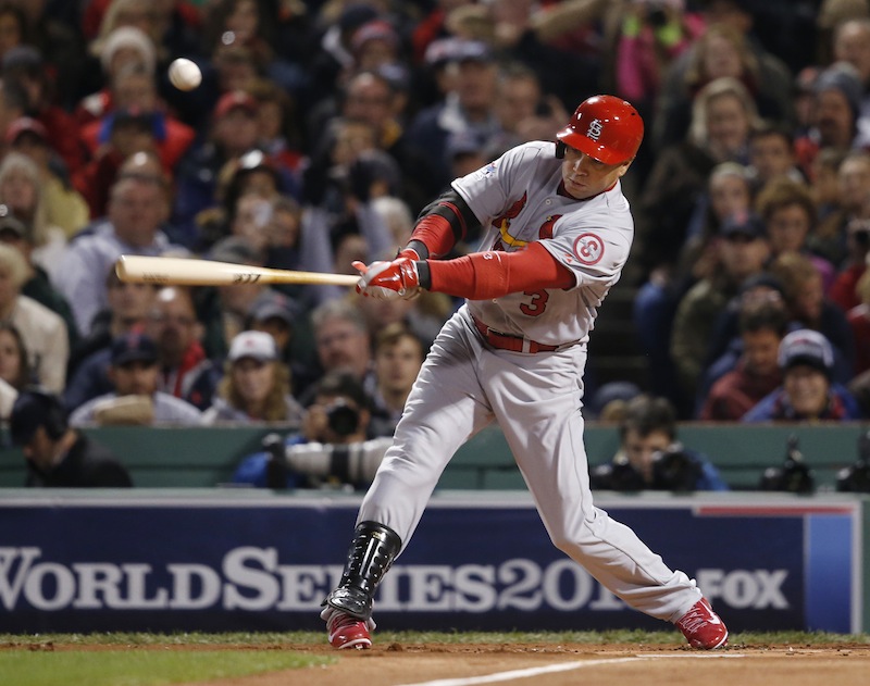 St. Louis Cardinals' Carlos Beltran hits a single off Boston Red Sox starting pitcher John Lackey during the first inning of Game 2 of baseball's World Series Thursday, Oct. 24, 2013, in Boston. MLB