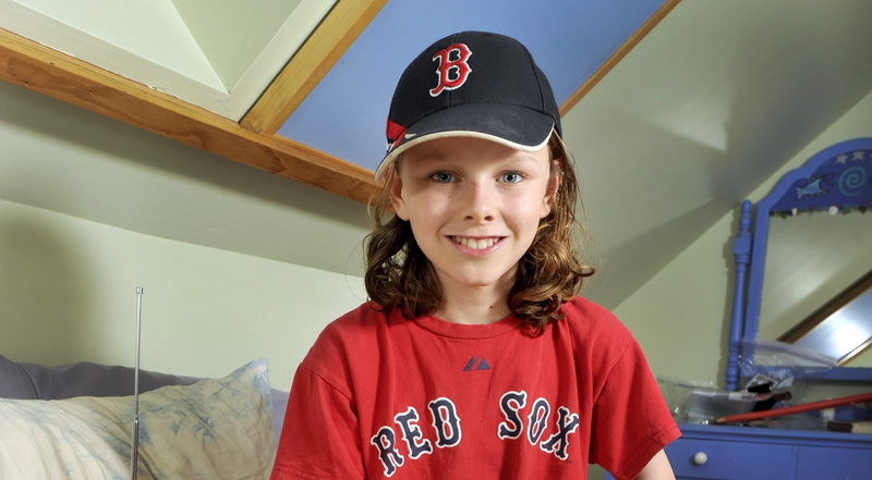 Finn Dierks-Brown, 12, says the Red Sox don’t lose when he listens to WEEI broadcasts, and hopes the team won’t be jinxed by ESPN Radio coverage of the World Series.