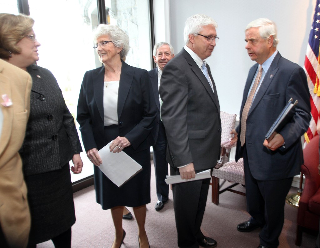 State Sen., Jeb Bradley, right, talks with Senate President Chuck Morse before announcing a Senate plan for Medicaid Expansion Thursday, Nov. 7, 2013, in Concord, N.H. The New Hampshire Legislature convenes for a special two-week session to take up Medicaid expansion. (AP Photo/Jim Cole)