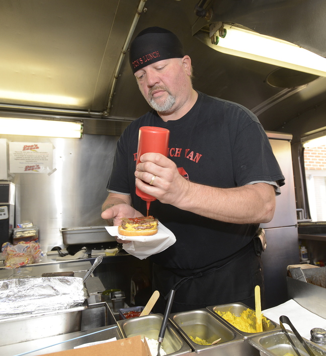 Don’s double cheeseburger, called “The Big One,” and french fries served by owner Jim Richards at Don’s Lunch on Main Street in Westbrook.