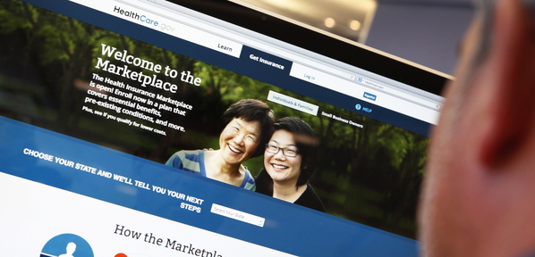 A man looks over the ACA signup page on the healthcare.gov website in this Oct. 2 photo illustration. Controversy over the fumbling of the website’s rollout shouldn’t be allowed to derail much-needed health care reform.
