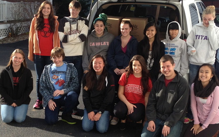 Members of the Sanford High School Key Club worked with other area outreach groups to package macaroni and cheese dinner packets for children in the Kids Care Food Program. Pictured, back row from left, are Shaelyn Kane, Ian Patterson, Jessica Carter, Rachel Belanger, Cherlline Ouch, Michelle Ouch and Heidi Demers. In front, from left, are Hannah Rossignol, Colin Patterson, Tian Morrisson, Hannah Howes, Zach Camire and Misa Mai.