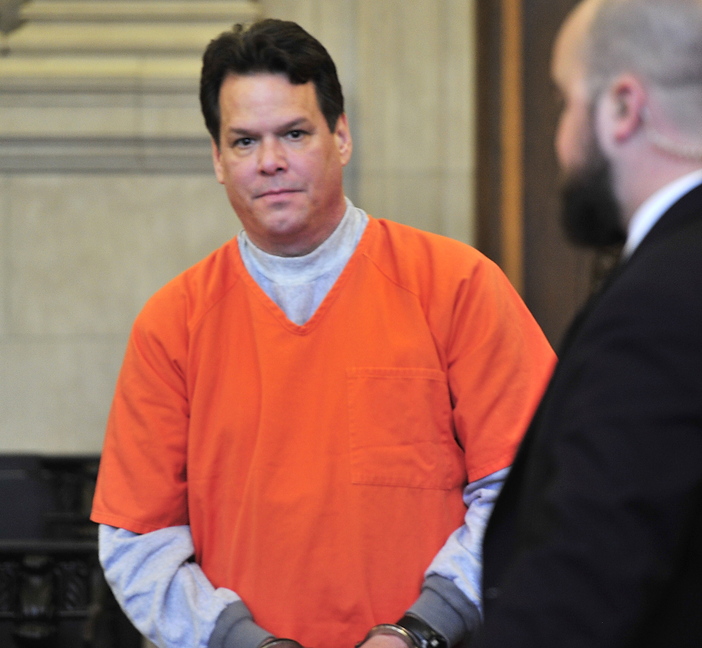 Dennis Dechaine listens in Cumberland County Unified Court in Portland on Thursday as DNA experts testify at his request for a new trial.