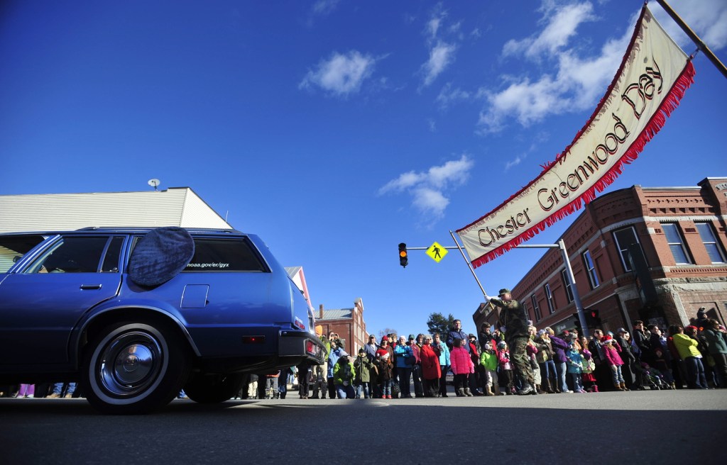 The annual Chester Greenwood Day parade crosses the Broadway and Main Street intersection in downtown Farmington on Saturday.