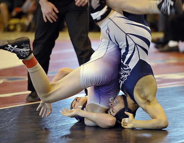 Kidayer Aljubyly of Portland, right, won the Western Class A and state titles at 106 pounds last winter and is a heavy favorite to repeat at the same weight.