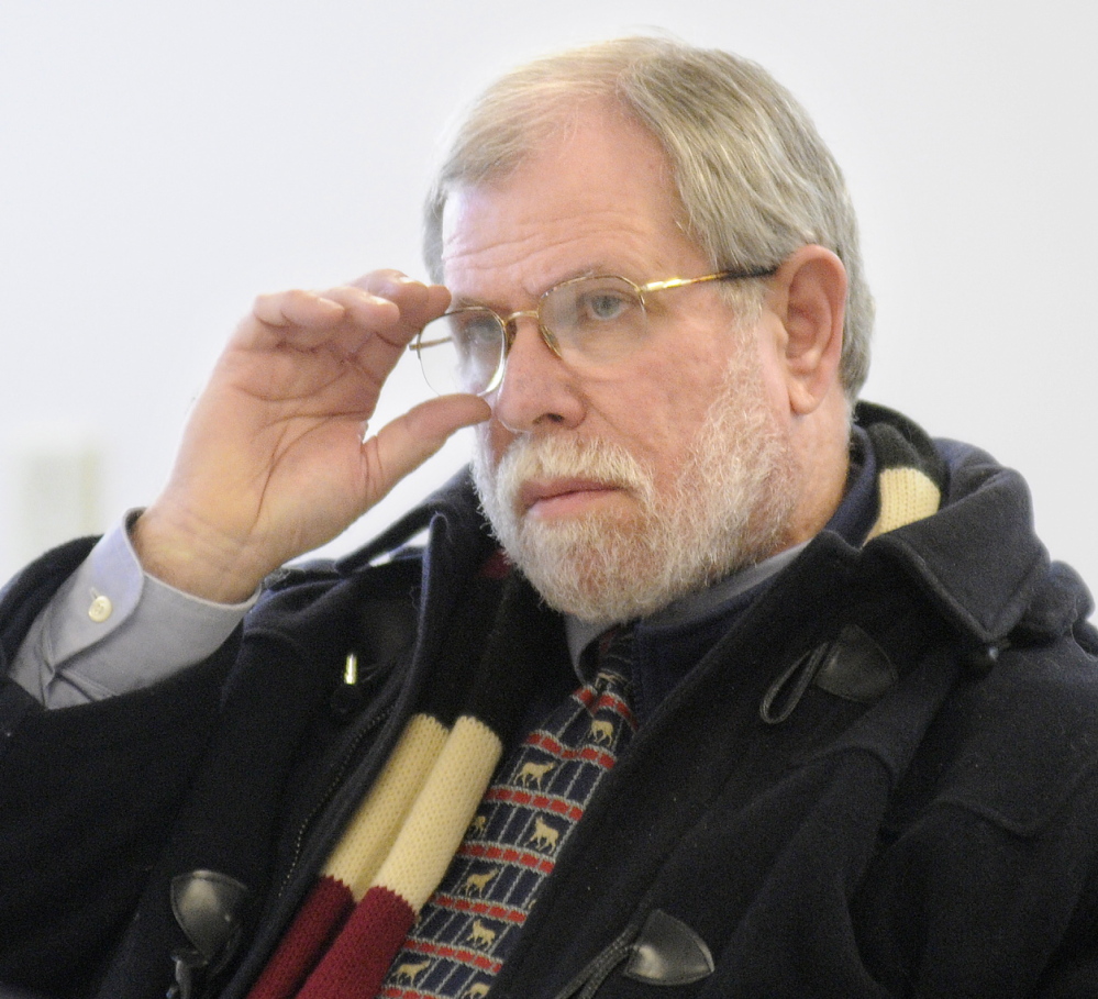 Discrimination hearing: AOS 97 Superintendent Gary Rosenthal watches the Maine Human Rights Commission Monday during a hearing in Augusta. The commission voted 3-1 Monday to find reasonable grounds to believe that a former payroll and benefits clerk in the Winthrop school system was subjected to illegal workplace discrimination and retaliation. Jennifer Ma Sims, 55, of East Winthrop, had worked for the schools for 11 years when her contract was not renewed by Alternative Organizational Structure 97 in June 2012.