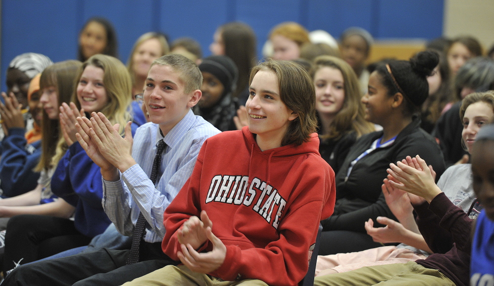 Portland native Ryan Flaherty of the Baltimore Orioles shares recollections of teachers and classes during a talk at Lyman Moore Middle School in Portland on Thursday.