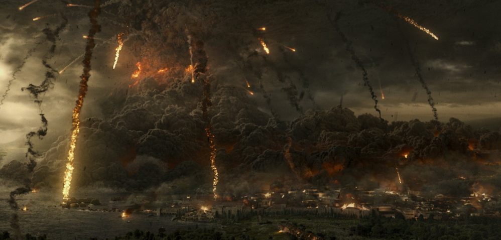 Smoke and fire pour from Vesuvius as the volcano erupts.