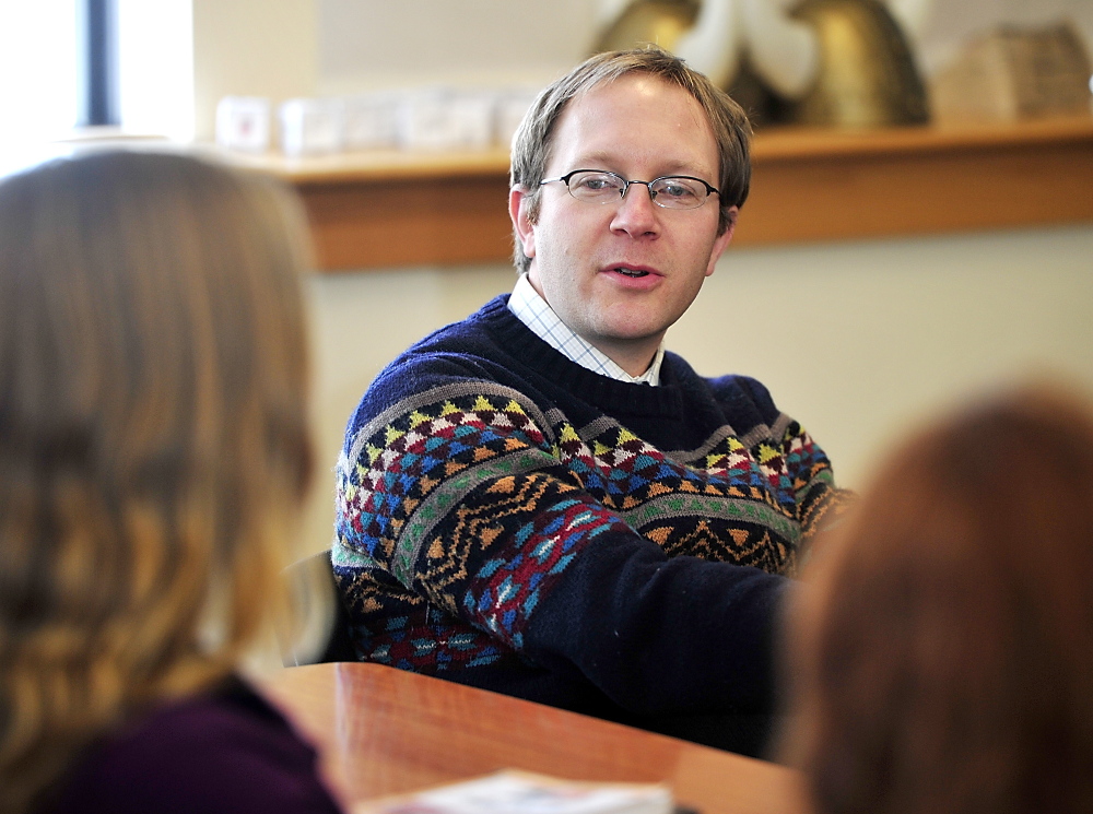 English teacher and adviser to the team, Jon York, gives feedback to team members on their speech as the Scarborough Academic Decathlon team practices before the state competition this weekend. Monday , February 24, 2014. Gordon Chibroski, Staff Photographer