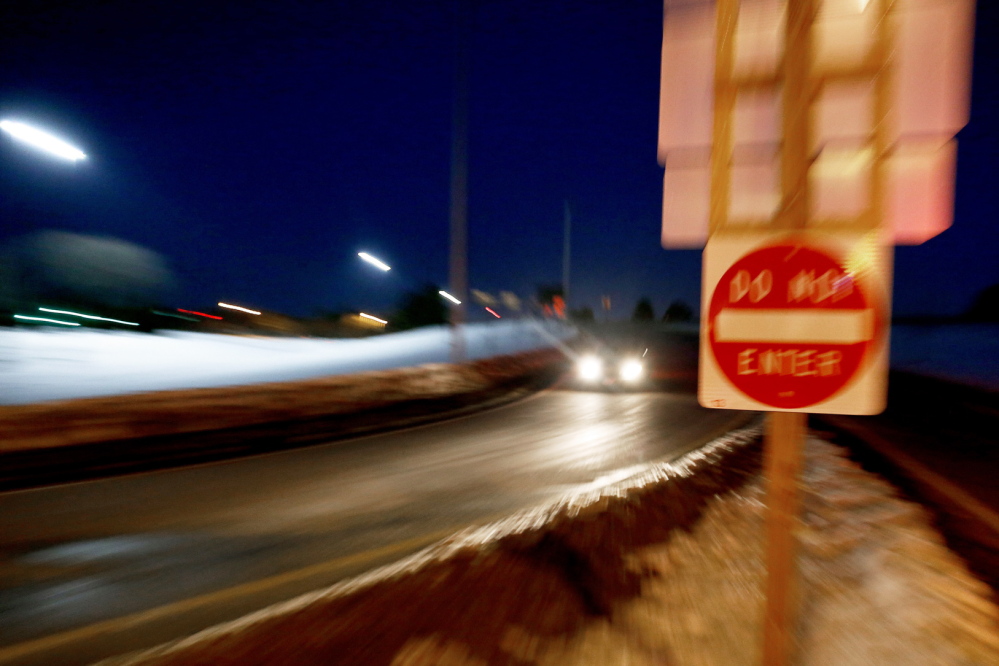 A Falmouth man drove the wrong way up this I-295 off-ramp from the Fore River Parkway in Portland Wednesday night, police say, then continued on I-295 in the wrong direction for nearly a mile and crashed into a car, injuring the woman driving it.
