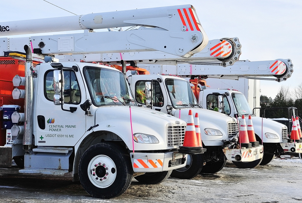 Utility flap: Rows of vehicles are parked at Central Maine Power Co.’s Augusta Service Building on Old Winthrop Road. Lawmakers on Monday delayed action on a bill that would change where public utilities register their vehicles, which would cost the city of Augusta $200,000 in excise taxes.