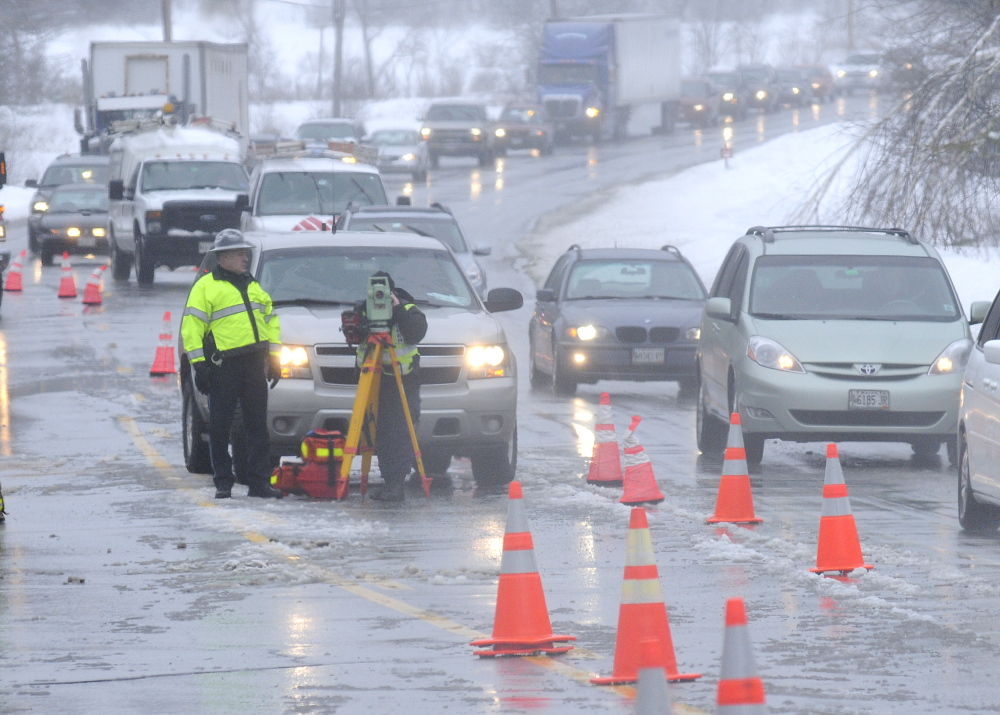 Police reconstruct a two-vehicle accident that claimed the life of a Winthrop man and injured a Winthrop woman on Route 202.