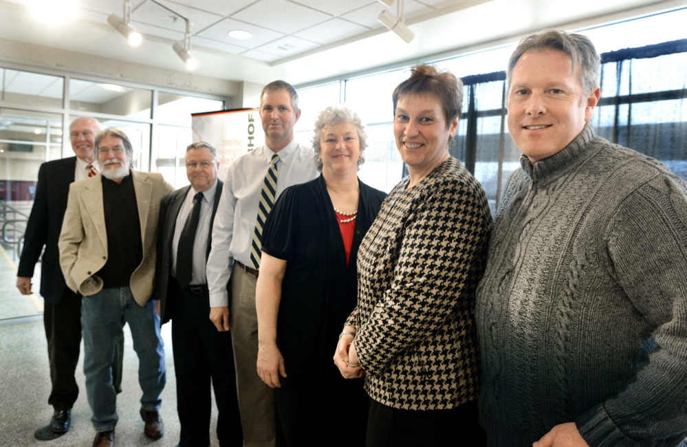 Seven of the 23 Maine Basketball Hall of Fame inductees of the first class are introduced at the Cumberland County Civic Center in Portland on Wednesday. From left: Richard Whitmore, Matt Donahue, Bob Brown, Doug Roberts, Lisa Blais Manning, Rachel Bouchard and Matt Hancock.