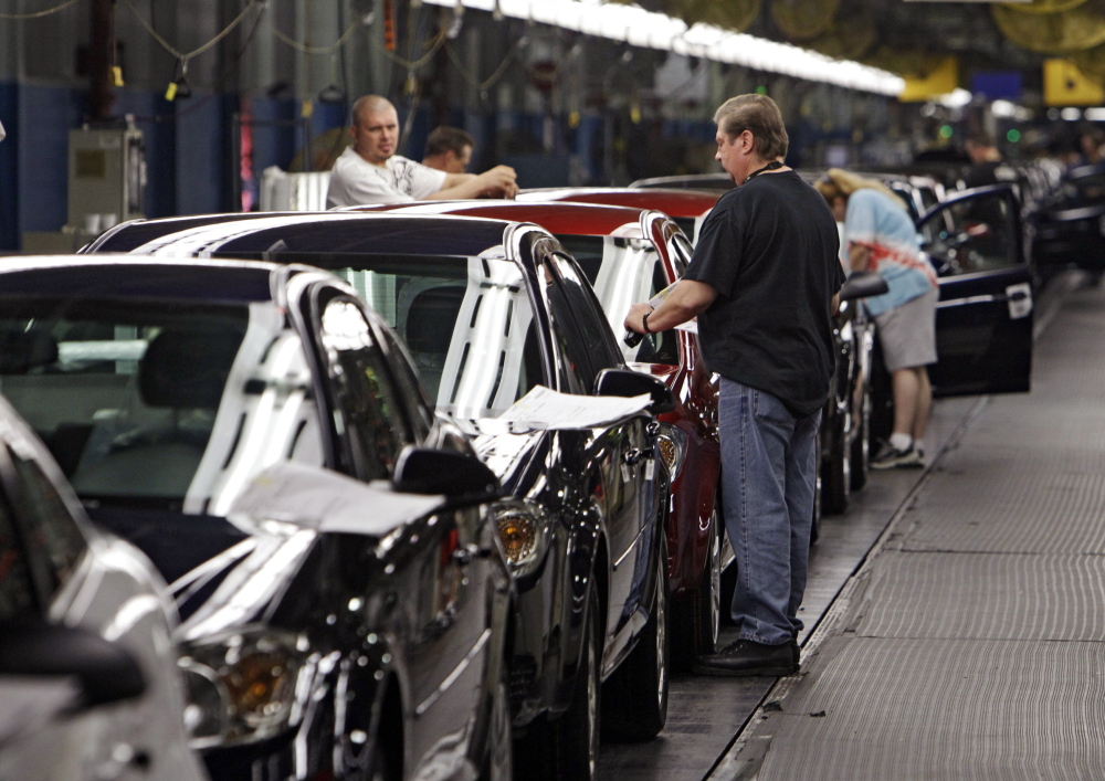 Workers at GM’s plant in Lordstown, Ohio, put the final touches on Chevy Cobalts. U.S. safety regulators are demanding that GM turn over documents detailing when the company knew about a dangerous ignition problem that has been linked to 13 car-crash deaths.