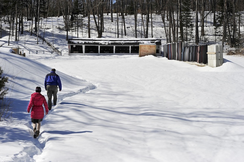 In this March 7 photo, Tammy Walter, club president, and Andy Tabor, past president, walk back to the shooting area at the Spurwink Rod & Gun Club. The Town Council unanimously approved a shooting range ordinance Monday night that members said will create a safer community.