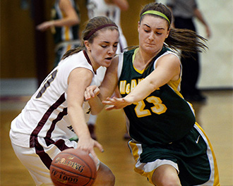 McAuley's Allie Clement, right, received the Miss Maine Basketball Award on Friday.