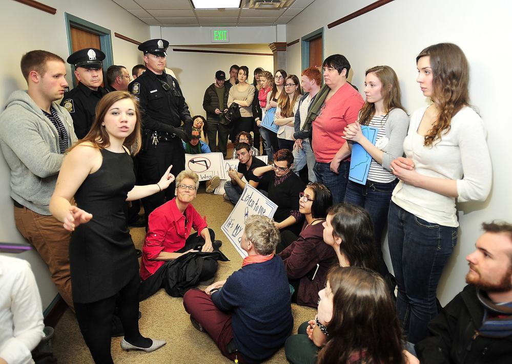 Brittany Hill, a fourth-year student at USM majoring in political science and economics, speaks her mind as students and faculty protest outside offices of the USM provost in March.