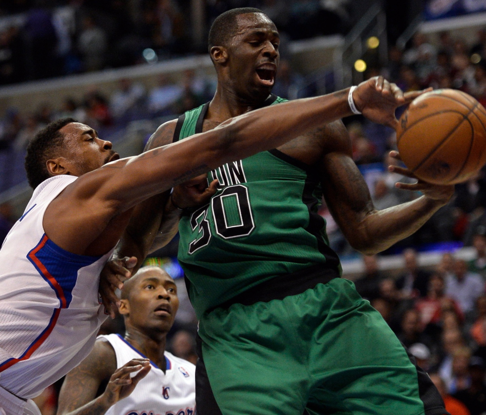 Brandon Bass, right, had a productive season with the Boston Celtics and may remain a piece of the puzzle – along with Jeff Green, Kelly Olynyk, Jared Sullinger and Avery Bradley. The road back to contending also figures to include high draft picks who are on the way.