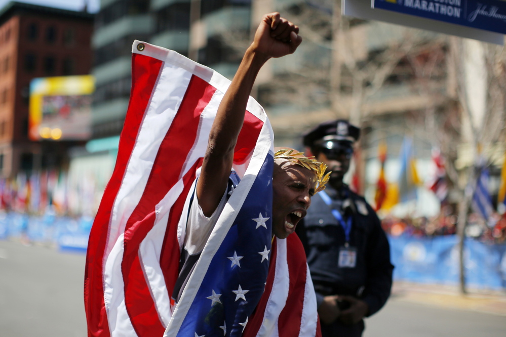 Meb Keflezighi wins the men's division of the 118th running of the Boston Marathon in Boston on Monday.