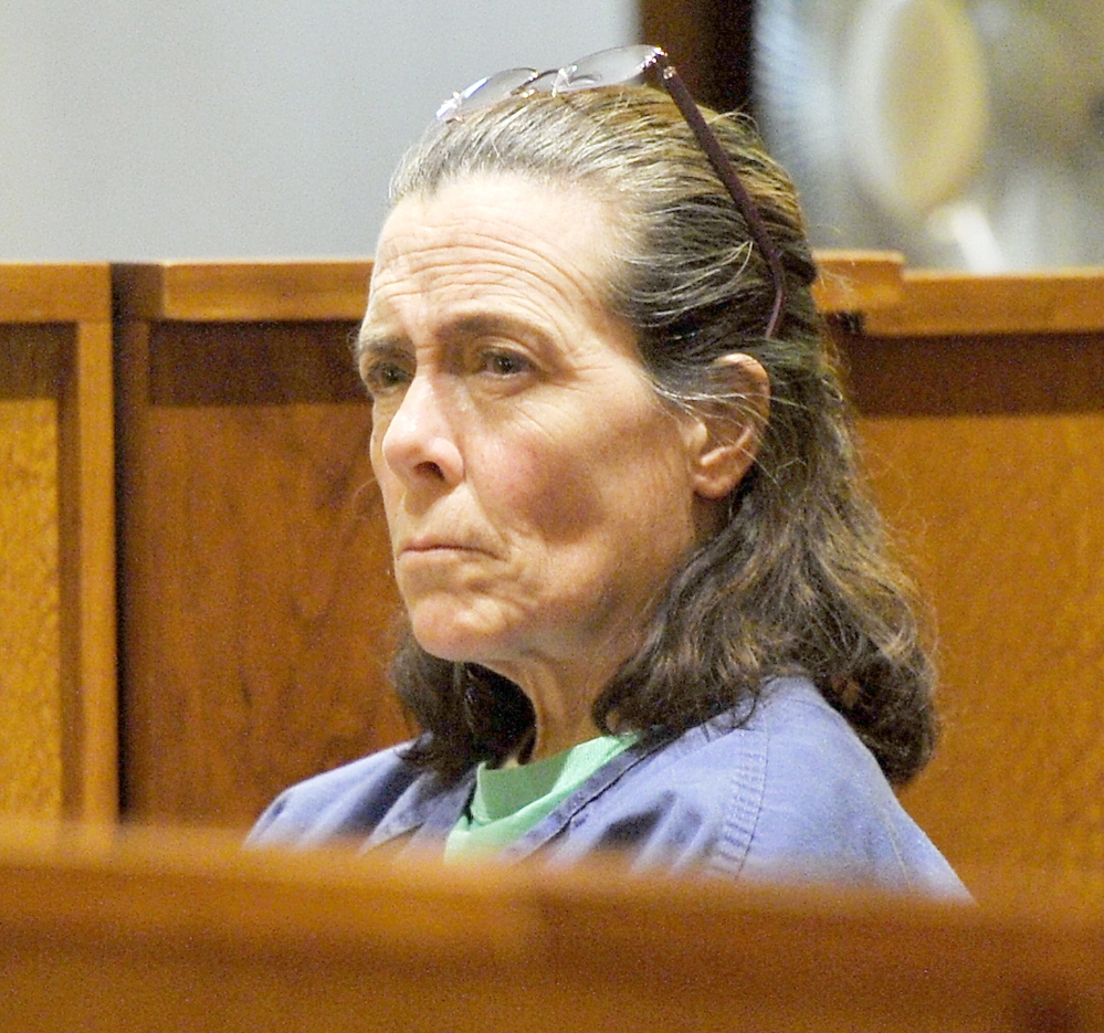 Kelly Jean Boyer, 52, of Portland waits Thursday at Cumberland County Courthouse before pleading guilty to her eighth drunken-driving offense. Gordon Chibroski/Staff Photographer
