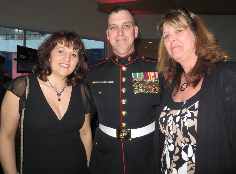 Denise and Tim Garland of Farmingdale and Goodwill employment specialist Laurie Wilson of Freeport