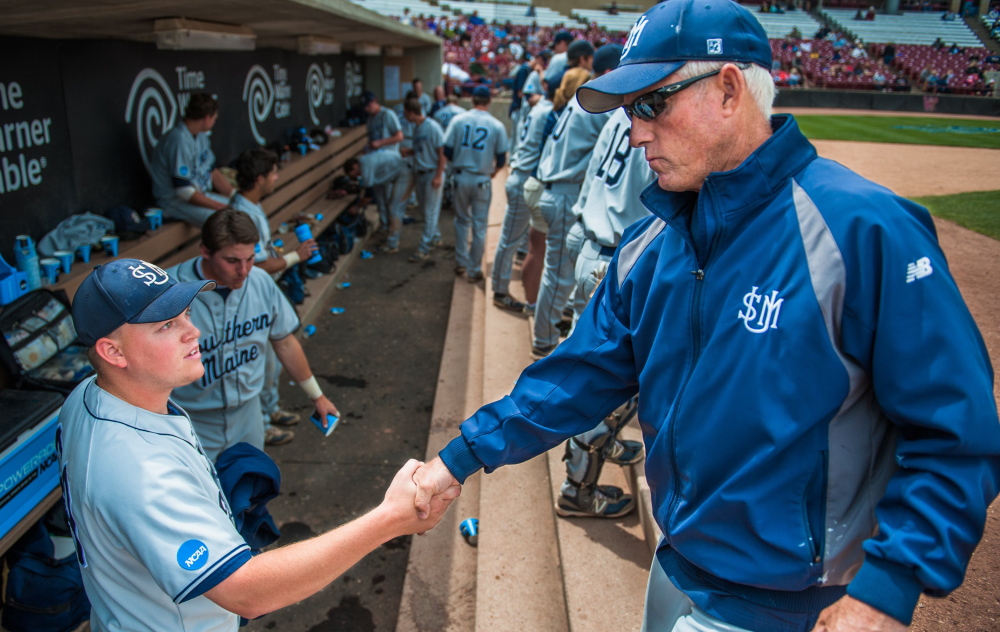 USM Head Coach Ed Flaherty congratulates pitcher Ryan Yates of Norway in last year’s Division III championships. Flaherty’s teams won national titles in 1991 and 1997.