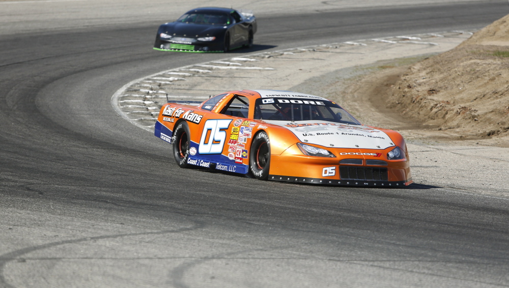 It’s pedal to the metal as Pro Series driver Jacob Dore rounds a turn during a practice run last week at Beech Ridge Motor Speedway in Scarborough. Beech Ridge’s season starts Saturday, with racing in three divisions.