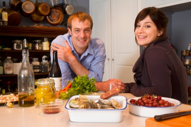 Chef, author and sustainable seafood expert Barton Seaver relaxes with his wife, Carrie Seaver in their South Freeport kitchen.