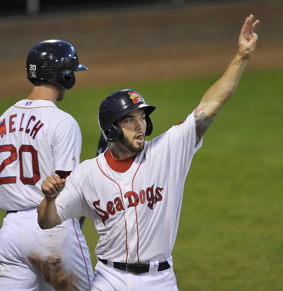 PORTLAND, ME - JUNE 3: Portland catcher, #5, Blake Swihart waves to the fans after hitting a home run as Portland Sea Dogs host the Erie Sea Wolves at Hadlock Field. (Photo by Gordon Chibroski/Staff Photographer)