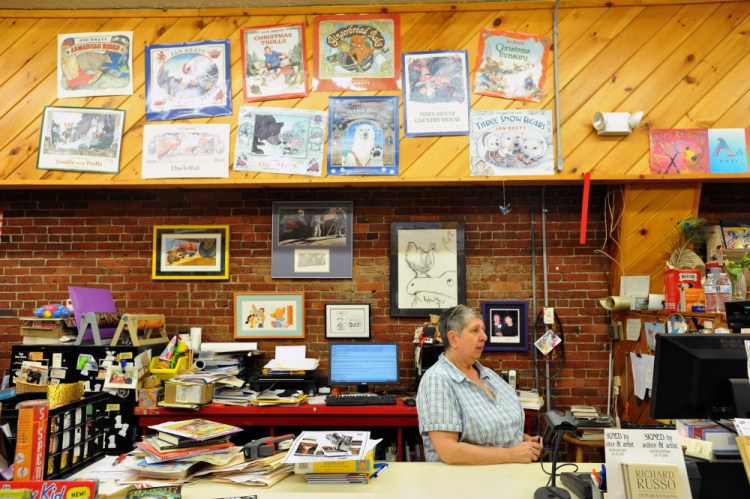 Photos by Michael G. Seamans/Morning Sentinel Ellen Richmond, owner of the Children’s Book Cellar in downtown Waterville, will be able to refurbish her store thanks to a grant from bestselling author James Patterson.